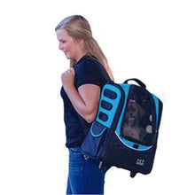 a lady in blue carrying her dog on her shoulder through an ocean blue  -in-1 Pet Carrier [Backpack/Tote/Roller Bag/Carrier/Car Seat