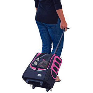 a lady dragging her dog inside a pink -in-1 Pet Carrier [Backpack/Tote/Roller Bag/Carrier/Car Seat
