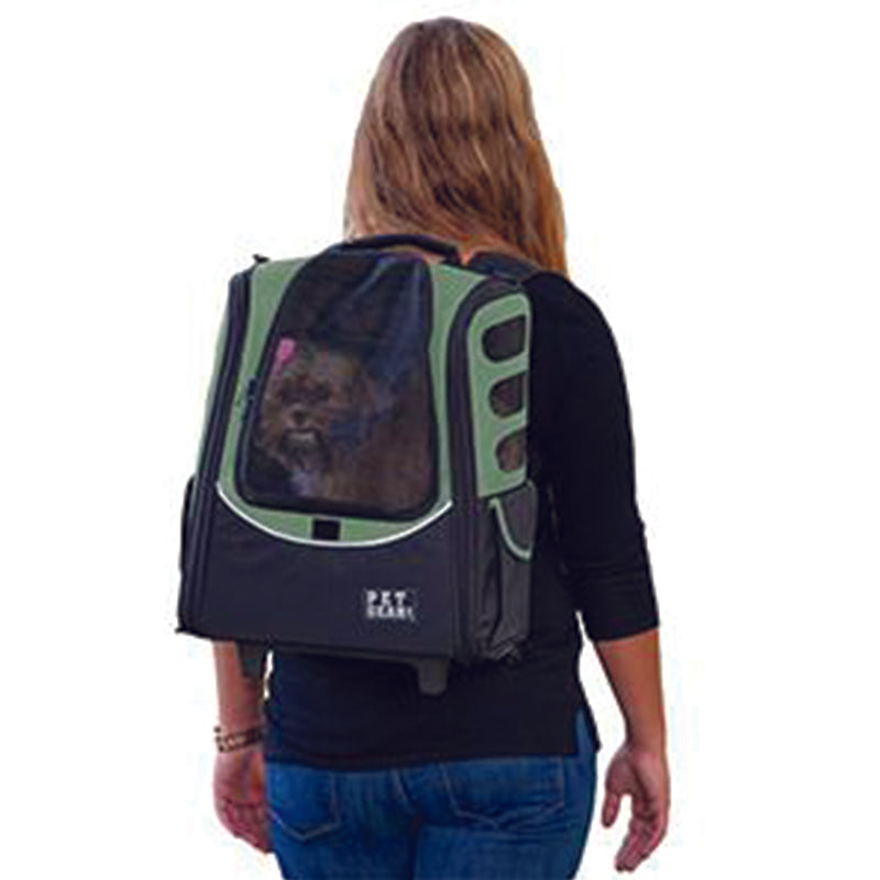 A lady carrying her dog on her back through a sage -in-1 Pet Carrier [Backpack/Tote/Roller Bag/Carrier/Car Seat