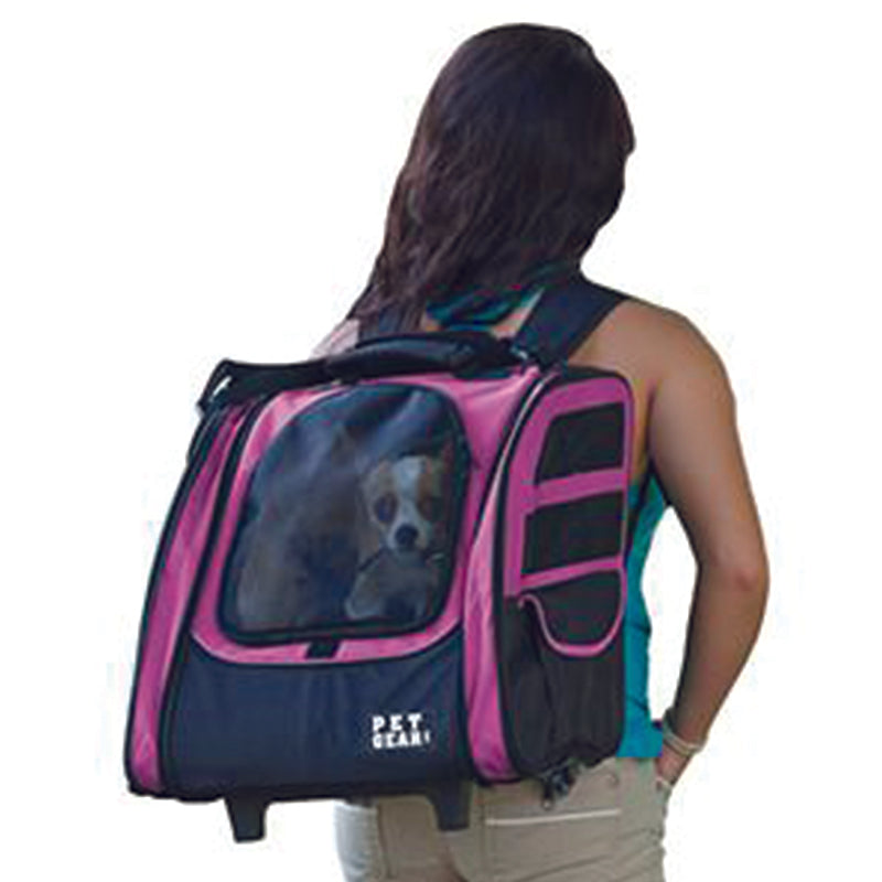 a lady carrying her dog on her back inside a 5-in-1 Pet Carrier [Backpack/Tote/Roller Bag/Carrier/Car Seat], Pink
